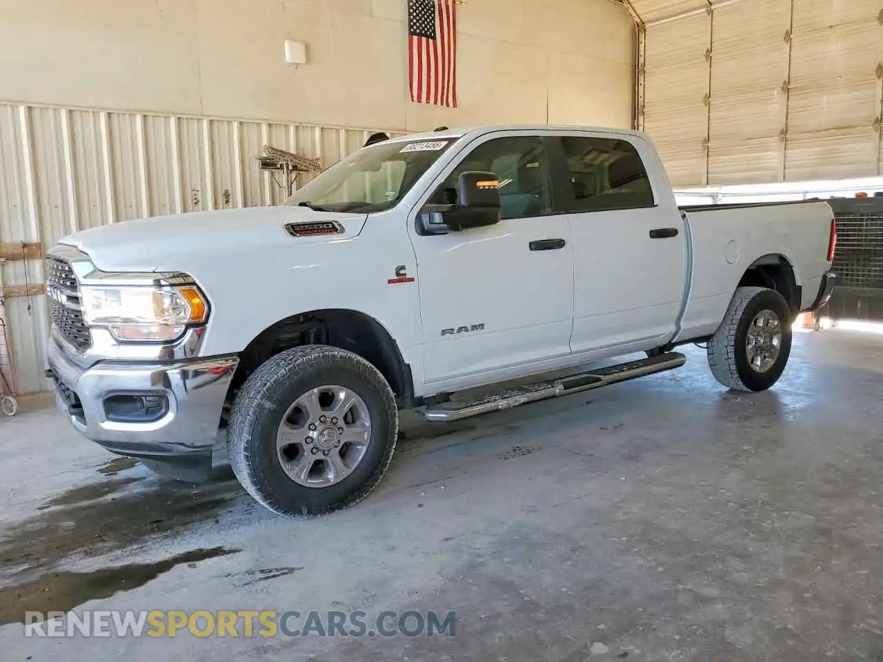 1 Photograph of a damaged car 3C6UR5DL8RG311183 RAM 2500 2024
