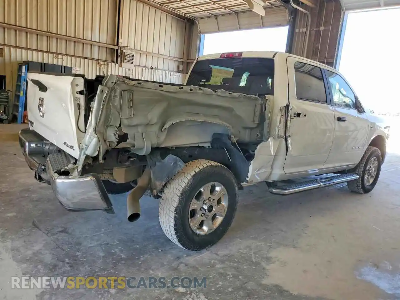 3 Photograph of a damaged car 3C6UR5DL8RG311183 RAM 2500 2024