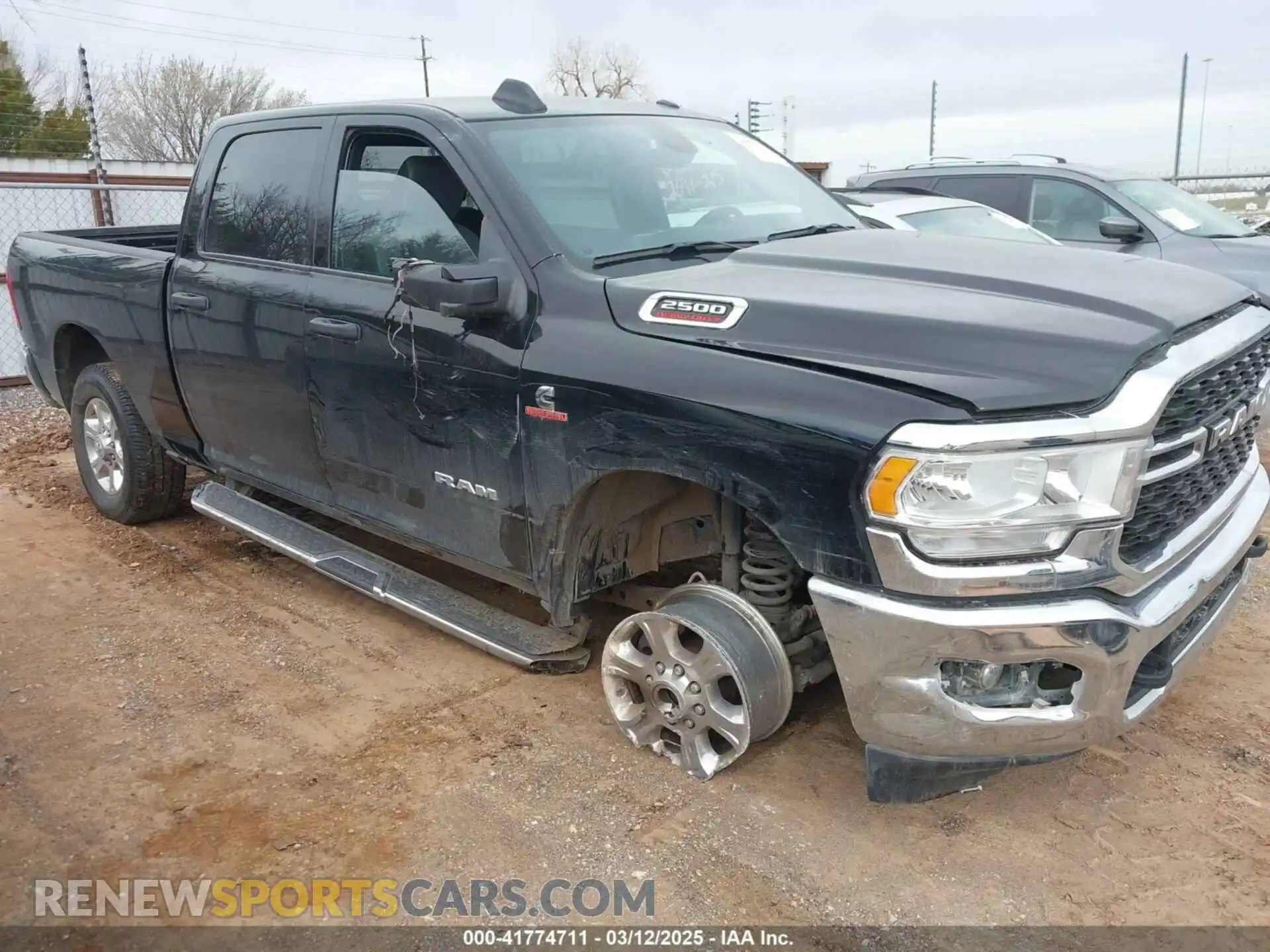 1 Photograph of a damaged car 3C6UR5DL8RG313936 RAM 2500 2024