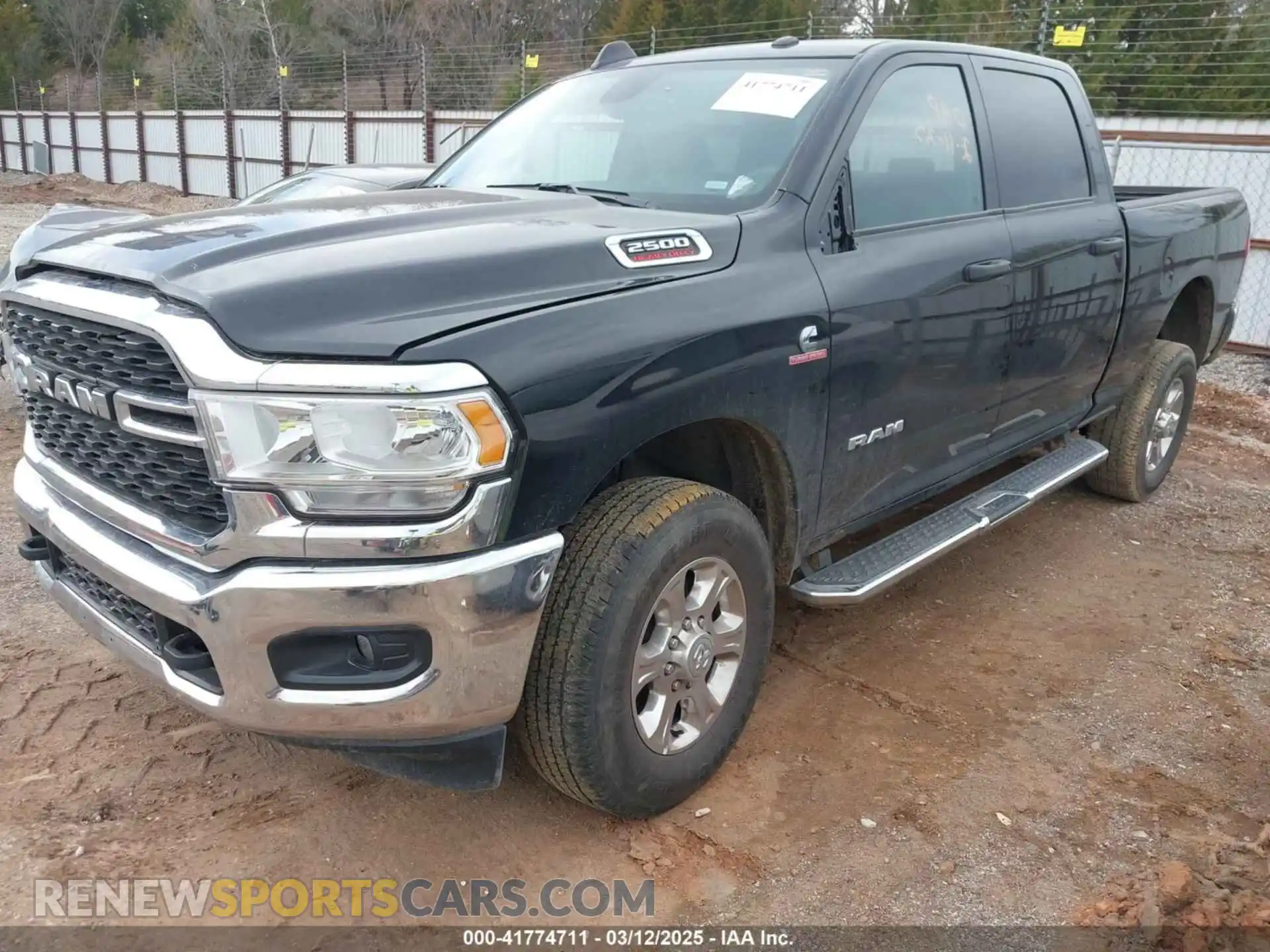 2 Photograph of a damaged car 3C6UR5DL8RG313936 RAM 2500 2024
