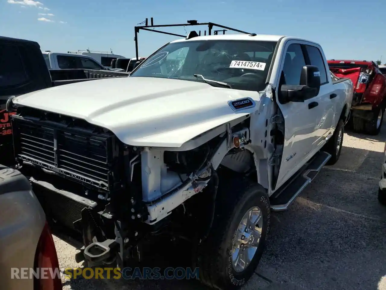 1 Photograph of a damaged car 3C6UR5DL9RG156353 RAM 2500 2024