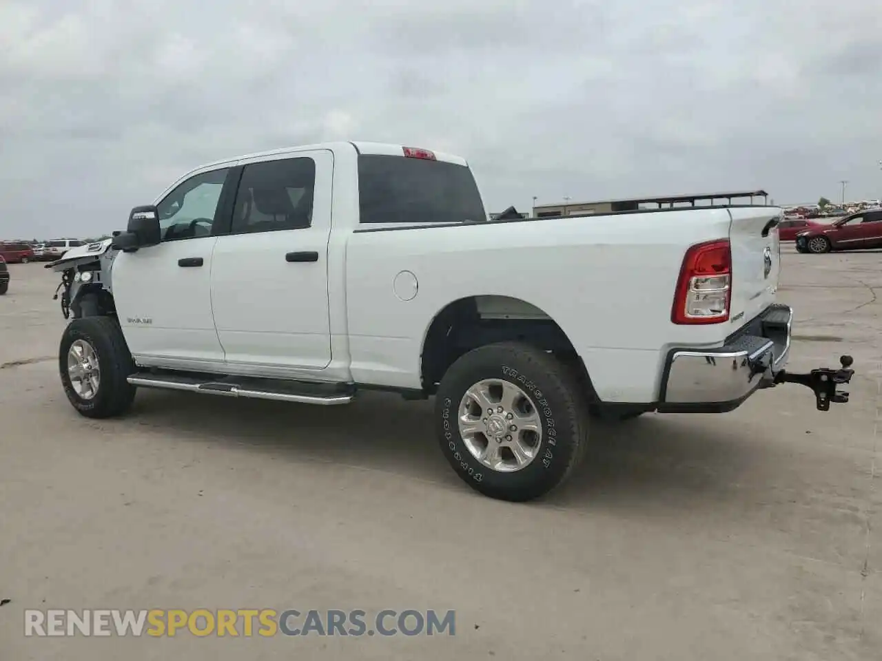 2 Photograph of a damaged car 3C6UR5DL9RG156353 RAM 2500 2024