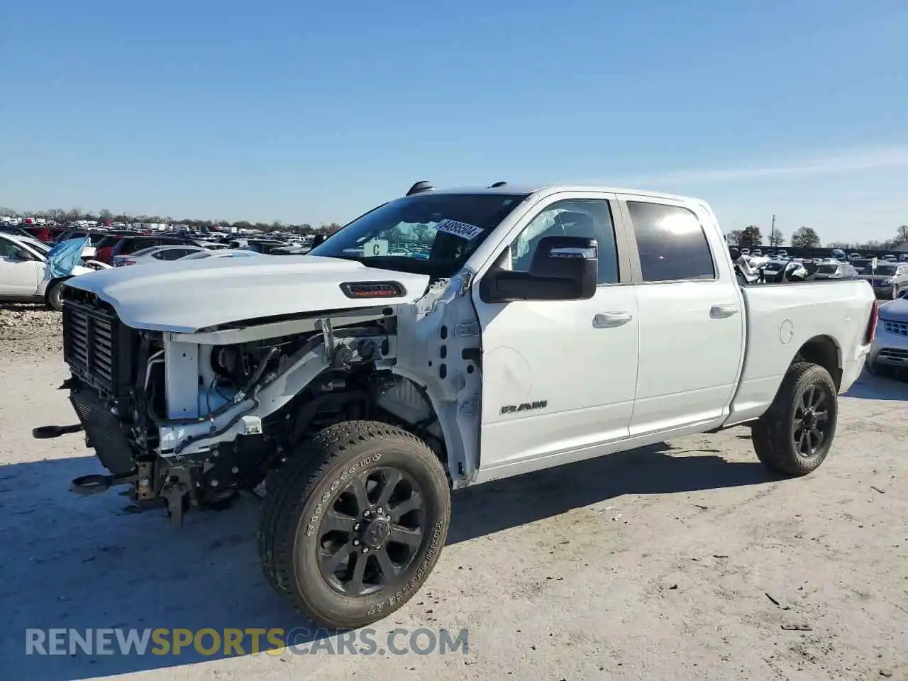 1 Photograph of a damaged car 3C6UR5DL9RG270238 RAM 2500 2024