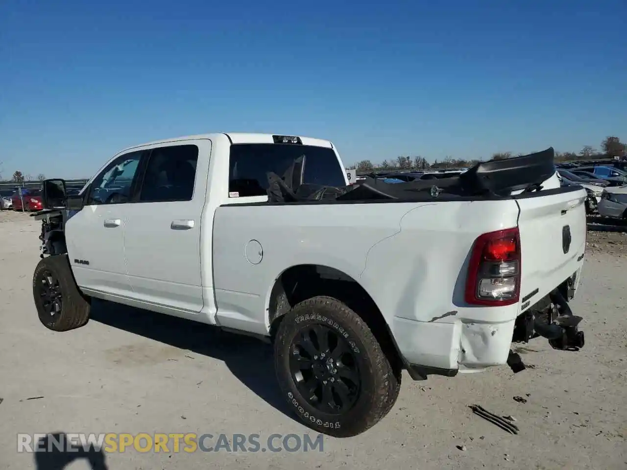2 Photograph of a damaged car 3C6UR5DL9RG270238 RAM 2500 2024