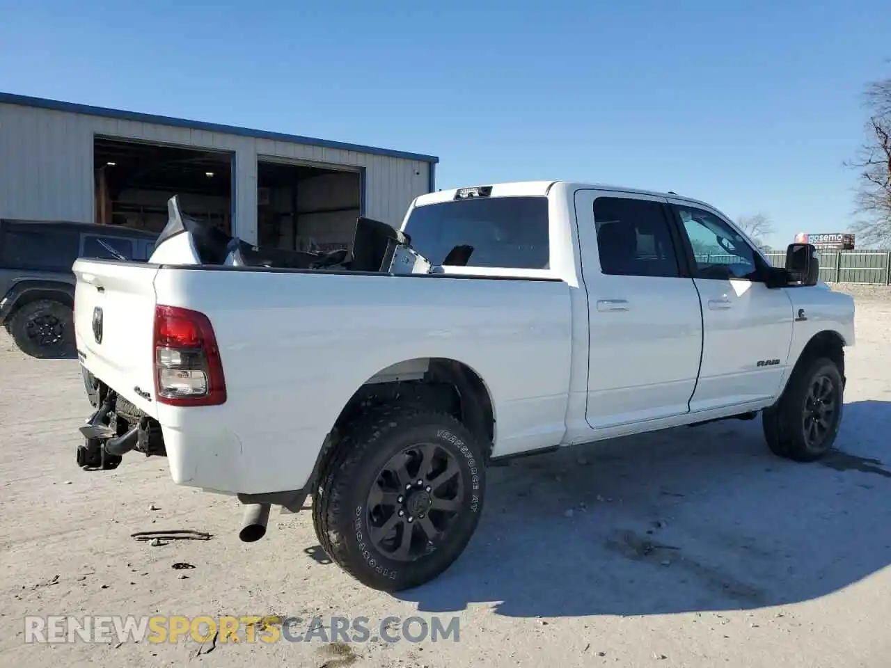 3 Photograph of a damaged car 3C6UR5DL9RG270238 RAM 2500 2024