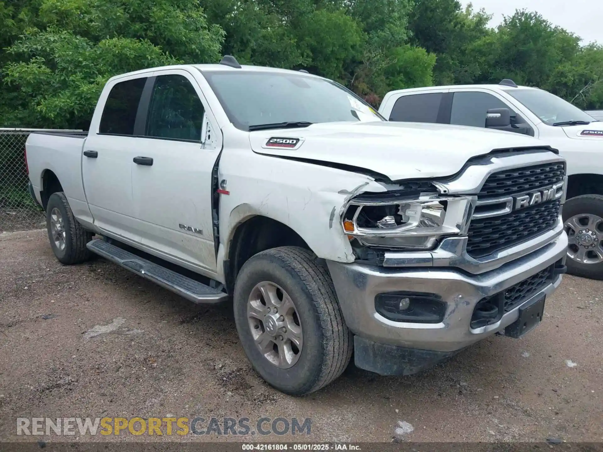 1 Photograph of a damaged car 3C6UR5DL9RG283488 RAM 2500 2024