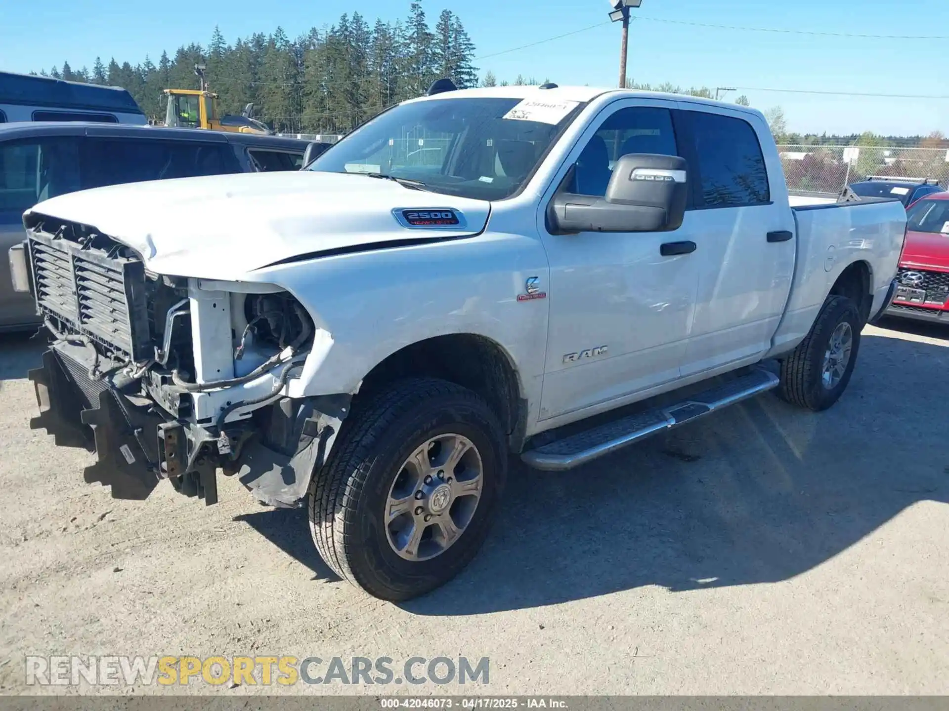 2 Photograph of a damaged car 3C6UR5DL9RG303433 RAM 2500 2024