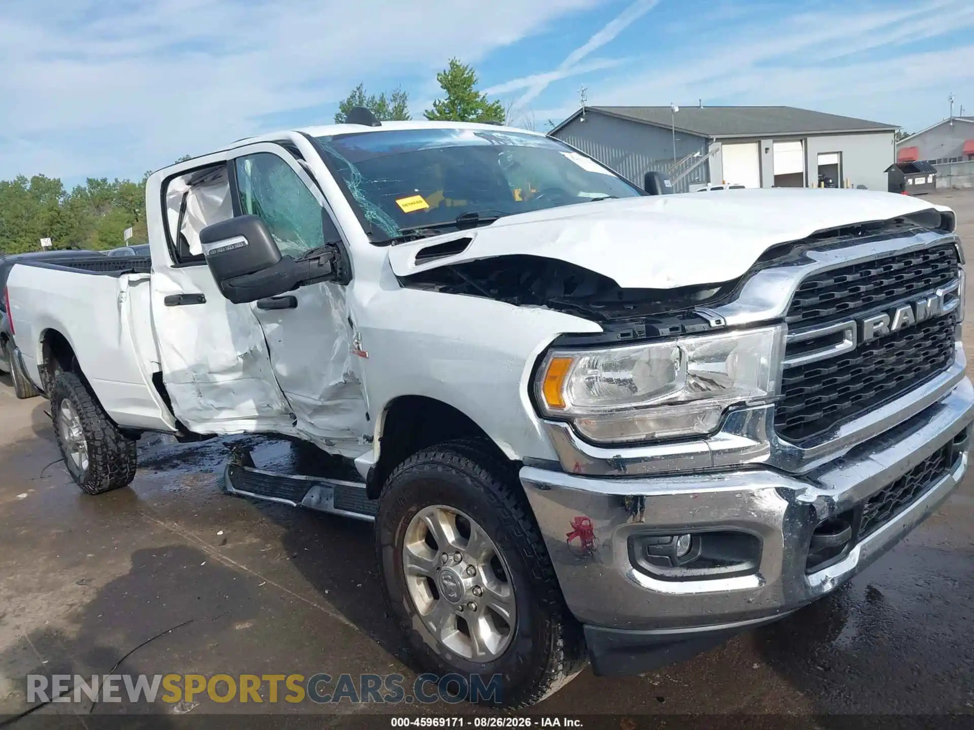 1 Photograph of a damaged car 3C6UR5DLXRG153798 RAM 2500 2024