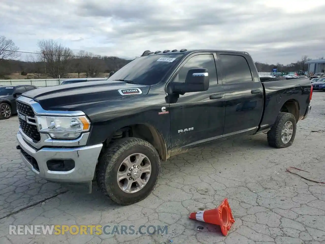 1 Photograph of a damaged car 3C6UR5DLXRG169662 RAM 2500 2024