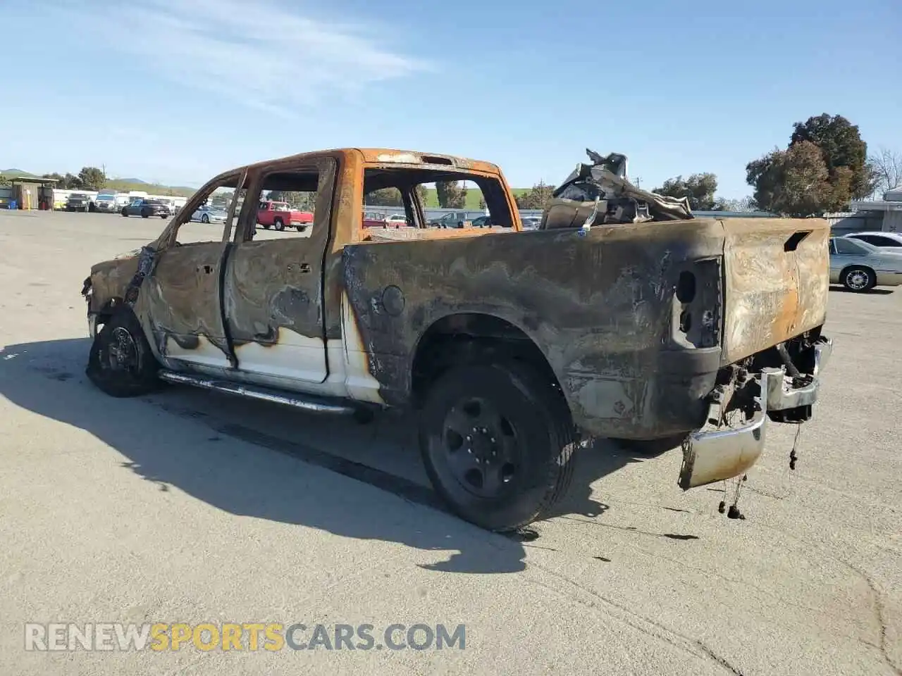 2 Photograph of a damaged car 3C6UR5DLXRG176742 RAM 2500 2024