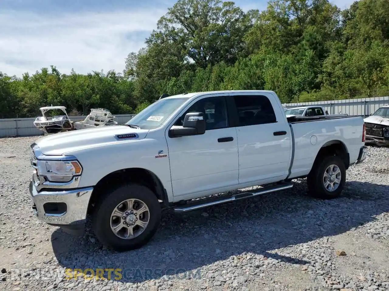 1 Photograph of a damaged car 3C6UR5DLXRG303165 RAM 2500 2024