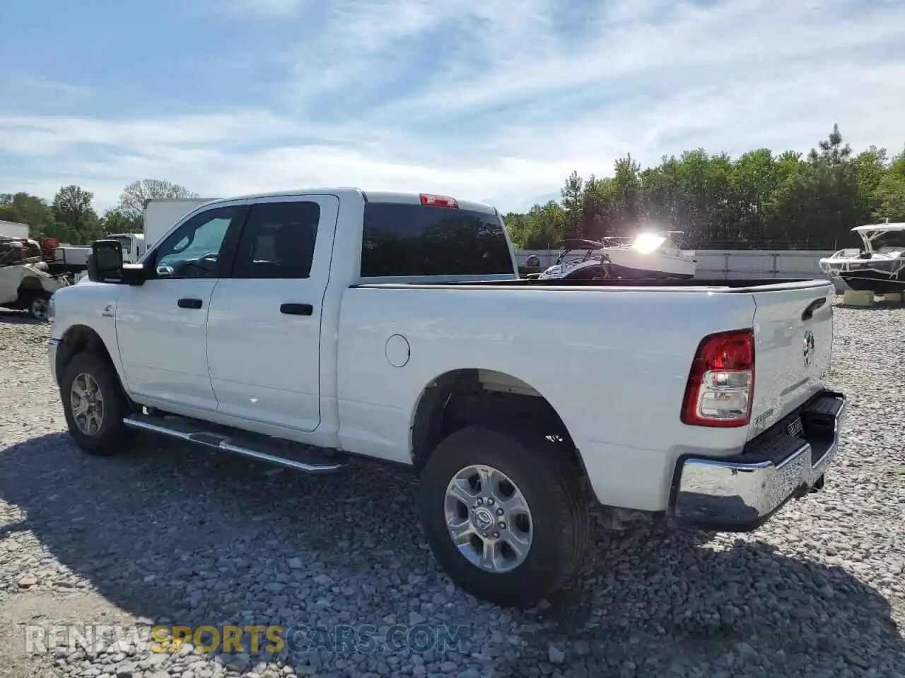 2 Photograph of a damaged car 3C6UR5DLXRG303165 RAM 2500 2024