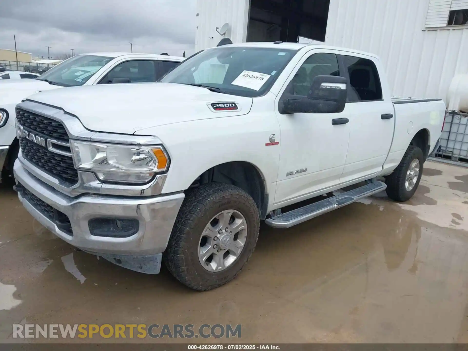 2 Photograph of a damaged car 3C6UR5DLXRG311203 RAM 2500 2024