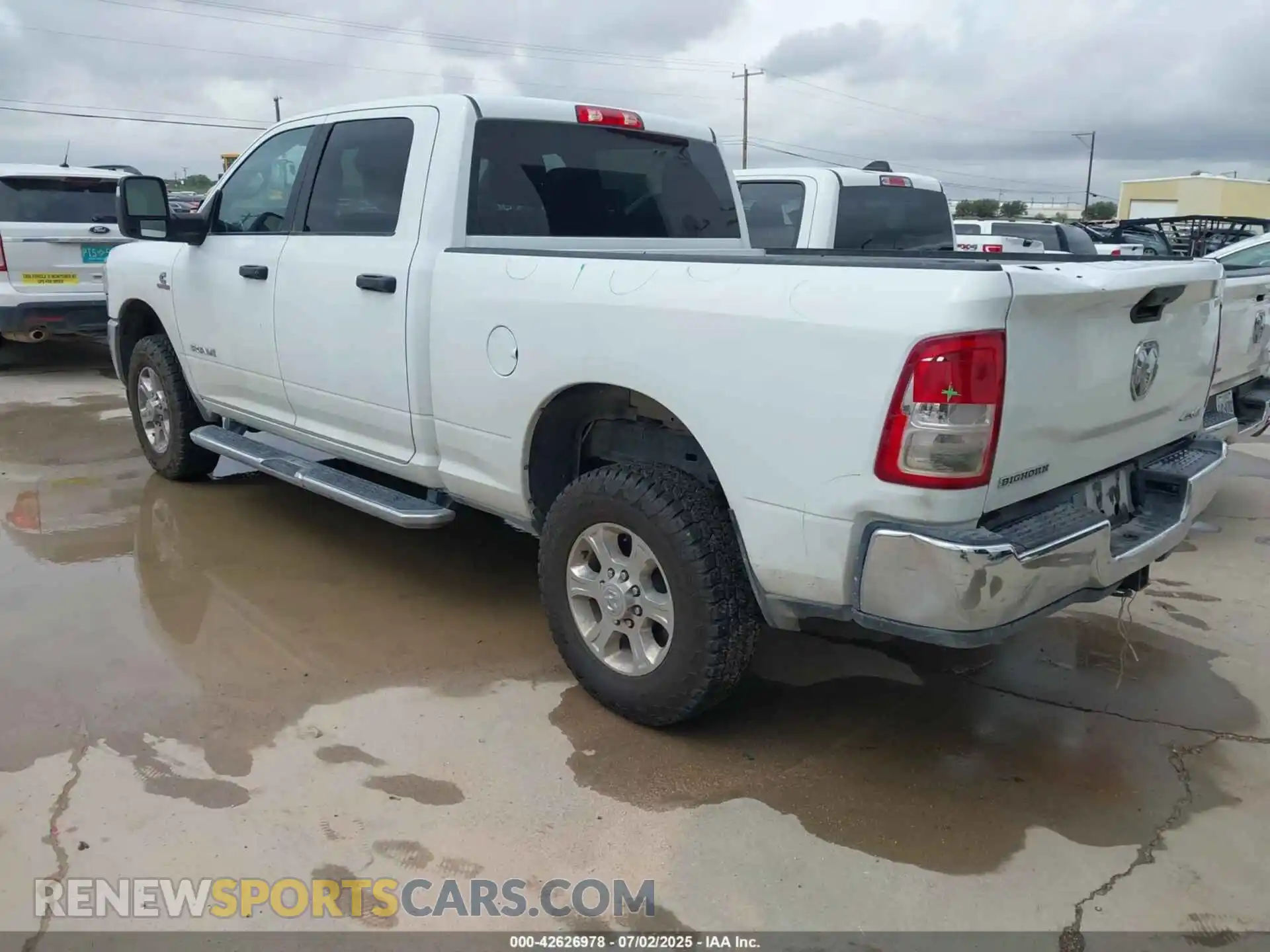3 Photograph of a damaged car 3C6UR5DLXRG311203 RAM 2500 2024