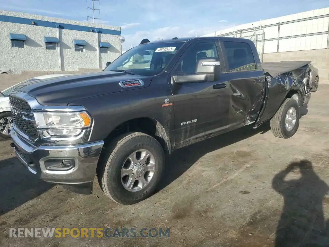 1 Photograph of a damaged car 3C6UR5DLXRG398763 RAM 2500 2024