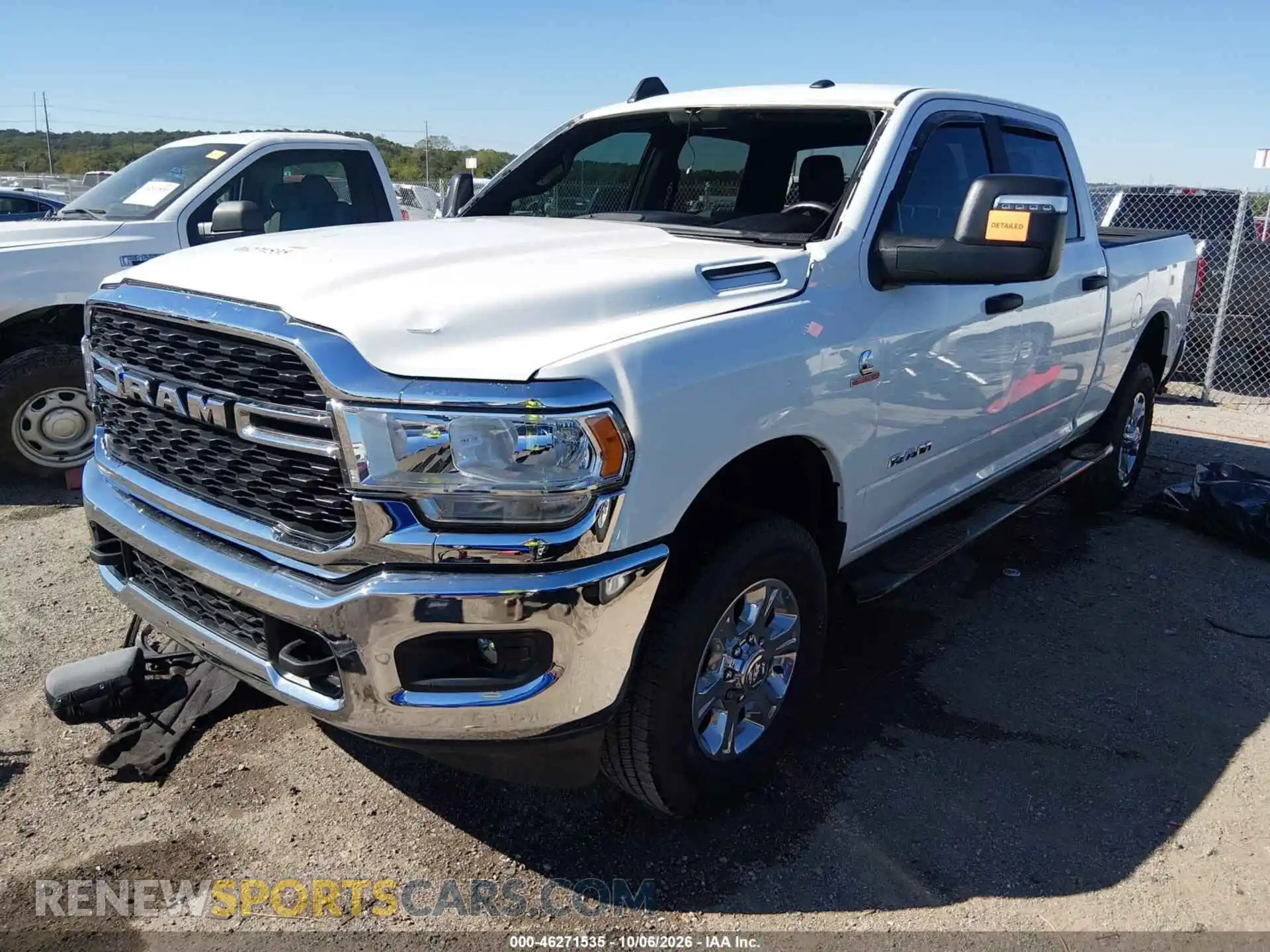 2 Photograph of a damaged car 3C6UR5DLXRG404044 RAM 2500 2024