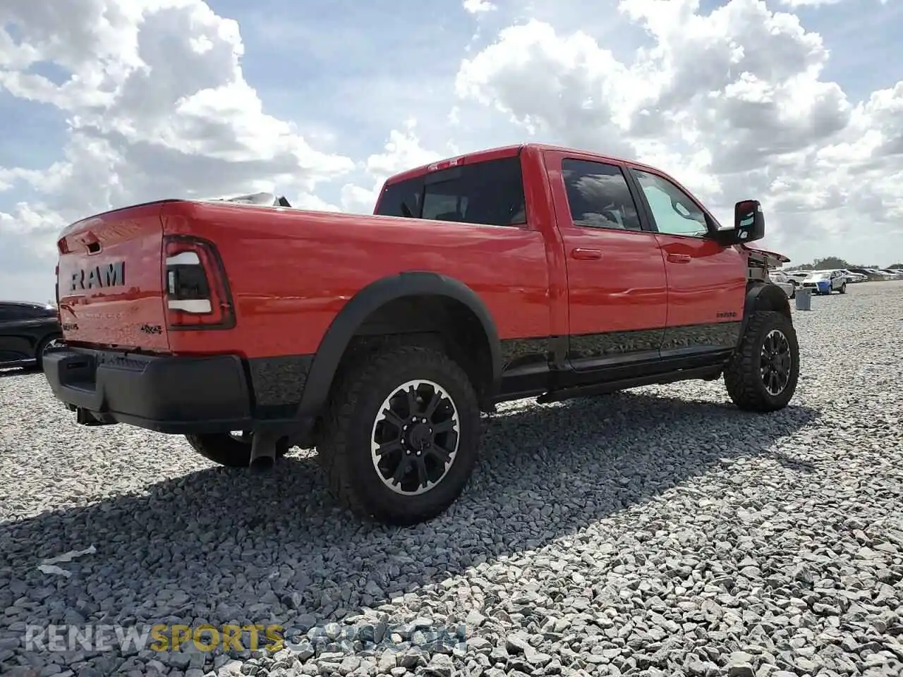 3 Photograph of a damaged car 3C6UR5EL0RG207351 RAM 2500 2024
