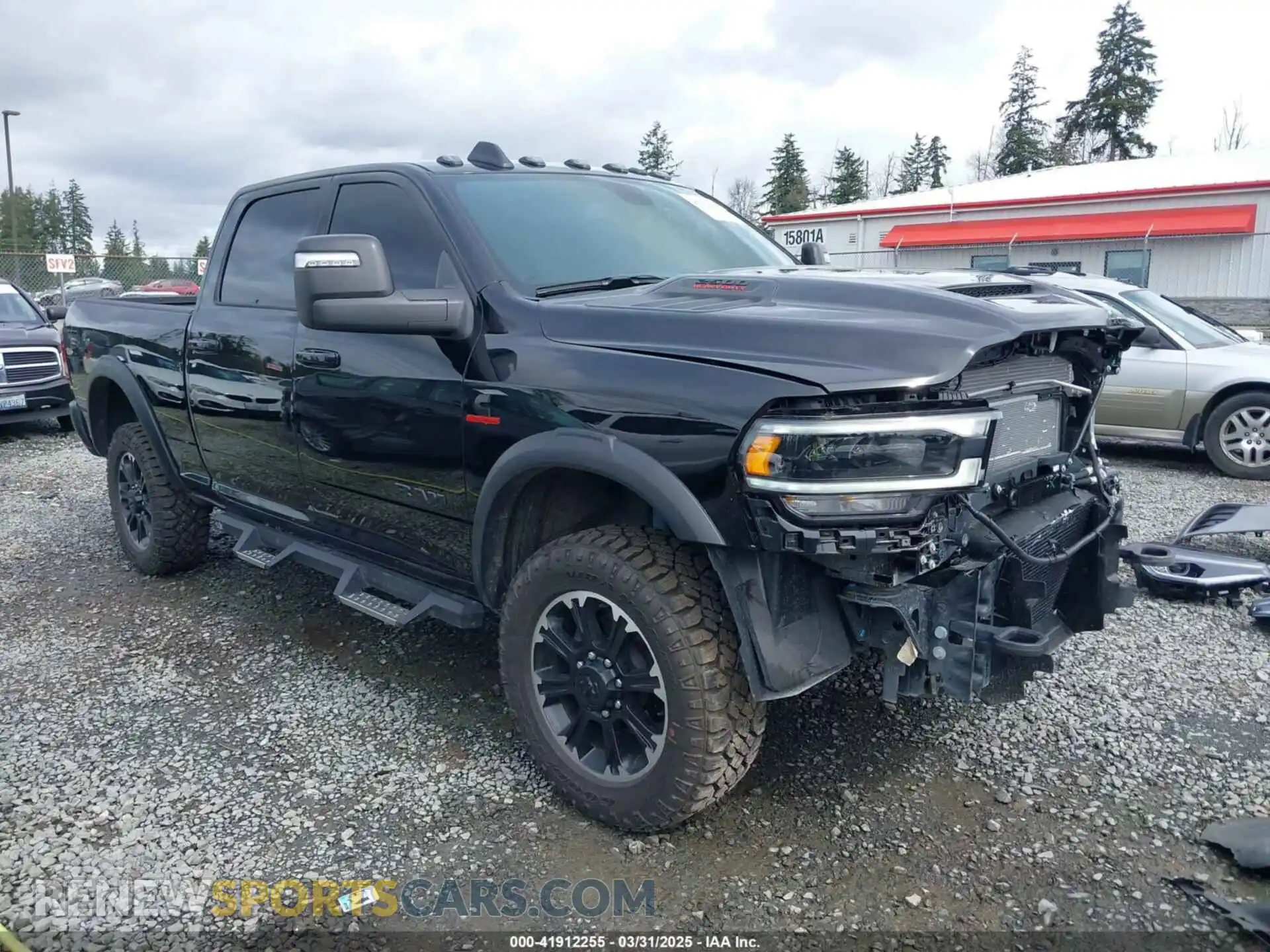 1 Photograph of a damaged car 3C6UR5EL1RG238463 RAM 2500 2024