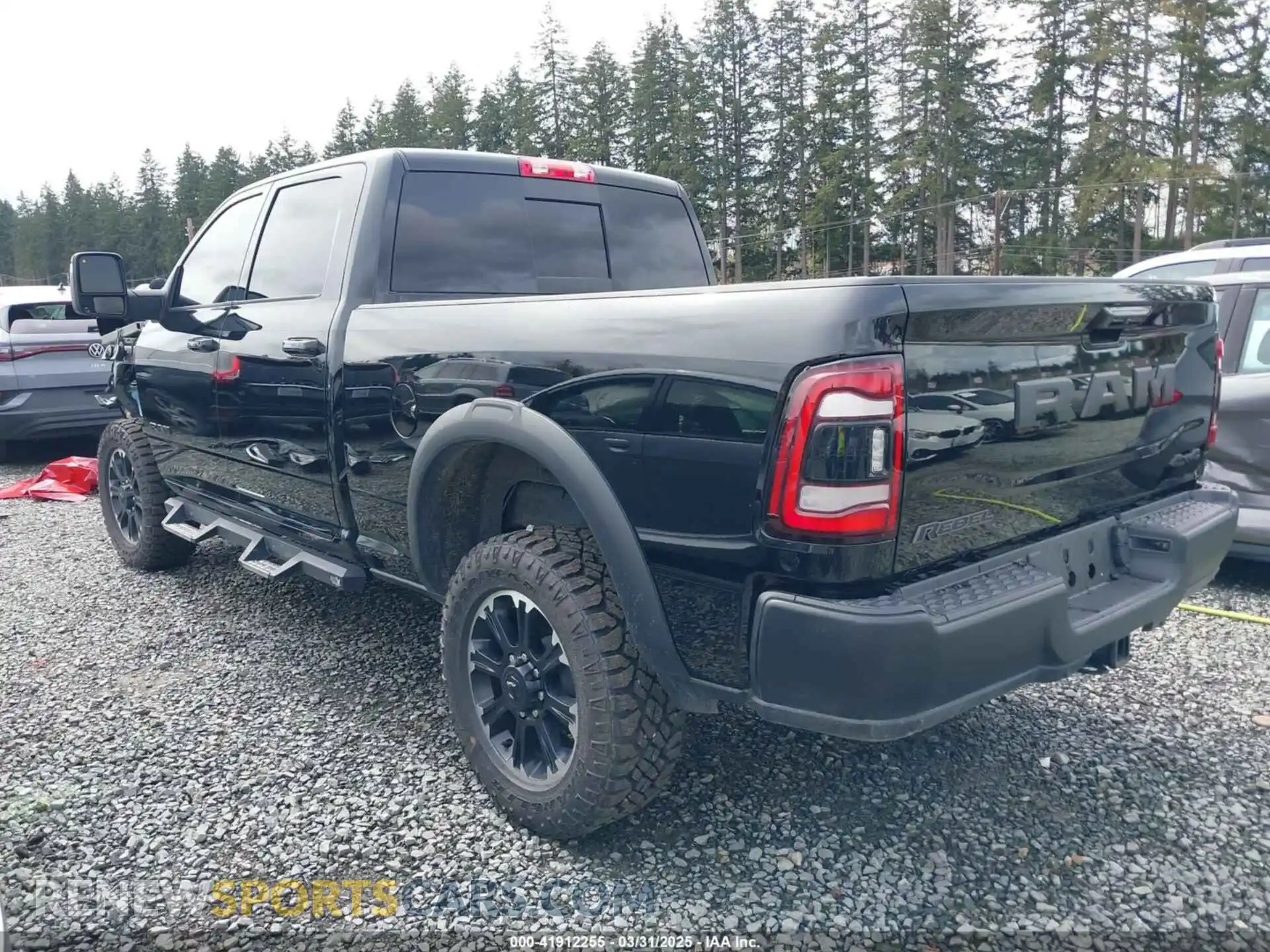 3 Photograph of a damaged car 3C6UR5EL1RG238463 RAM 2500 2024