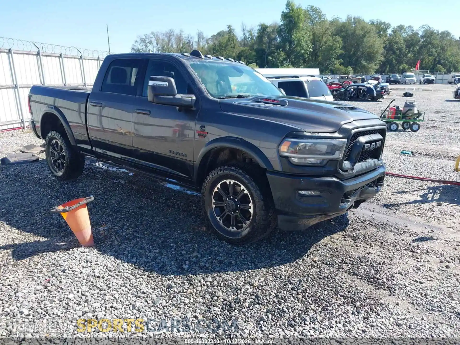 1 Photograph of a damaged car 3C6UR5EL3RG161191 RAM 2500 2024