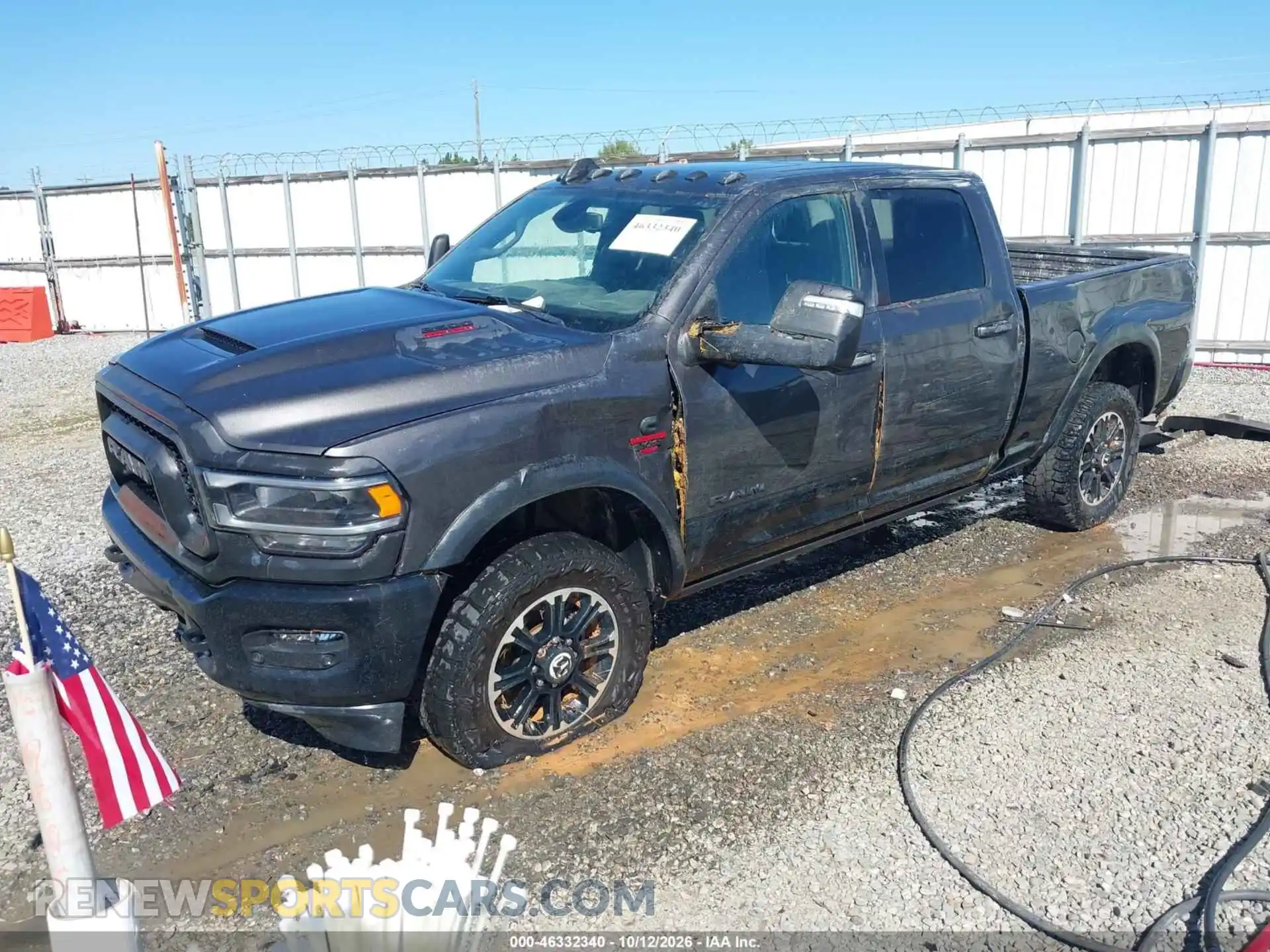 2 Photograph of a damaged car 3C6UR5EL3RG161191 RAM 2500 2024