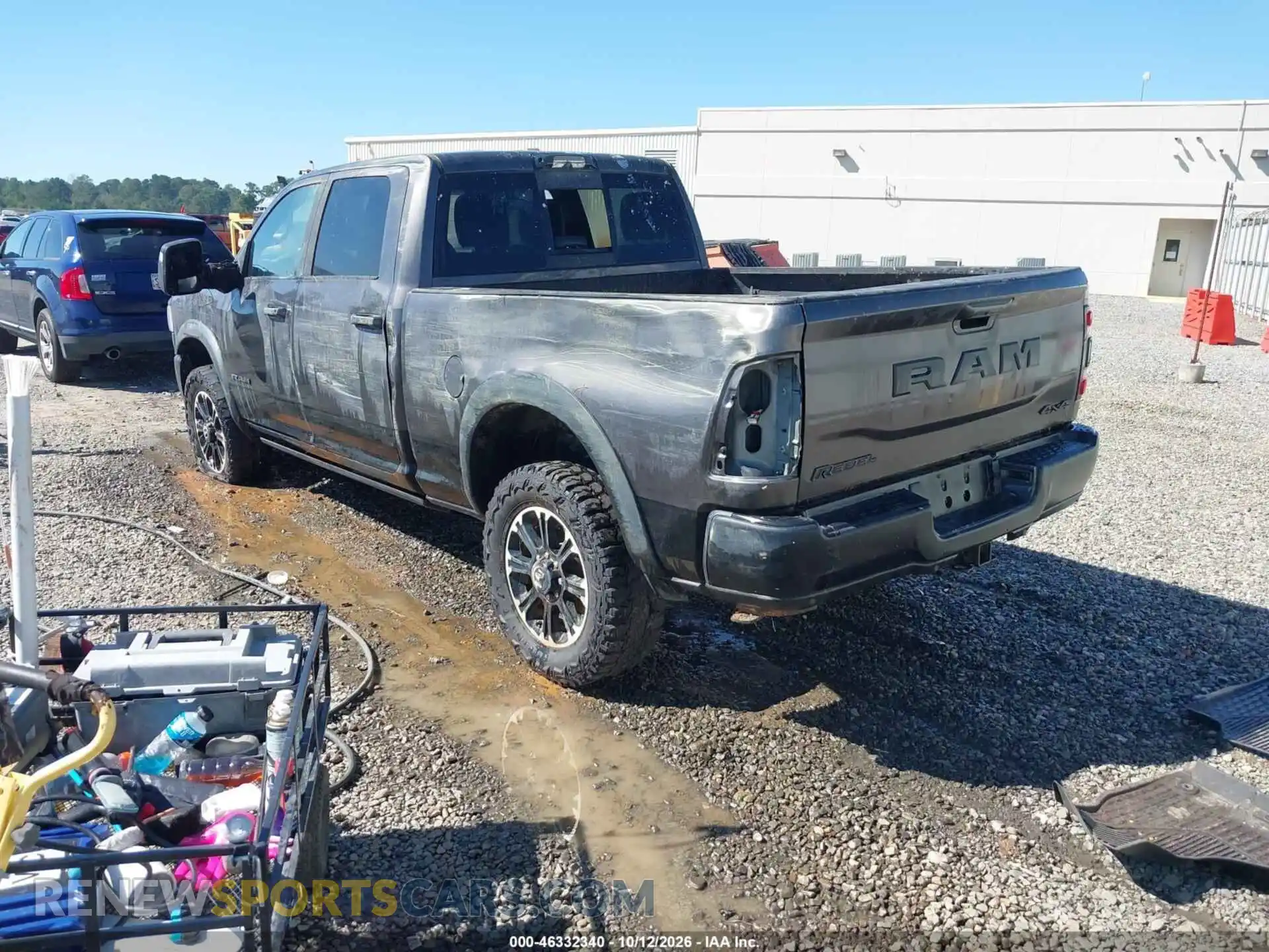 3 Photograph of a damaged car 3C6UR5EL3RG161191 RAM 2500 2024