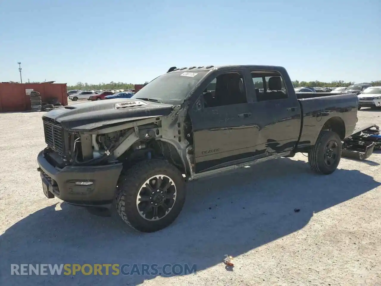 1 Photograph of a damaged car 3C6UR5EL5RG104149 RAM 2500 2024