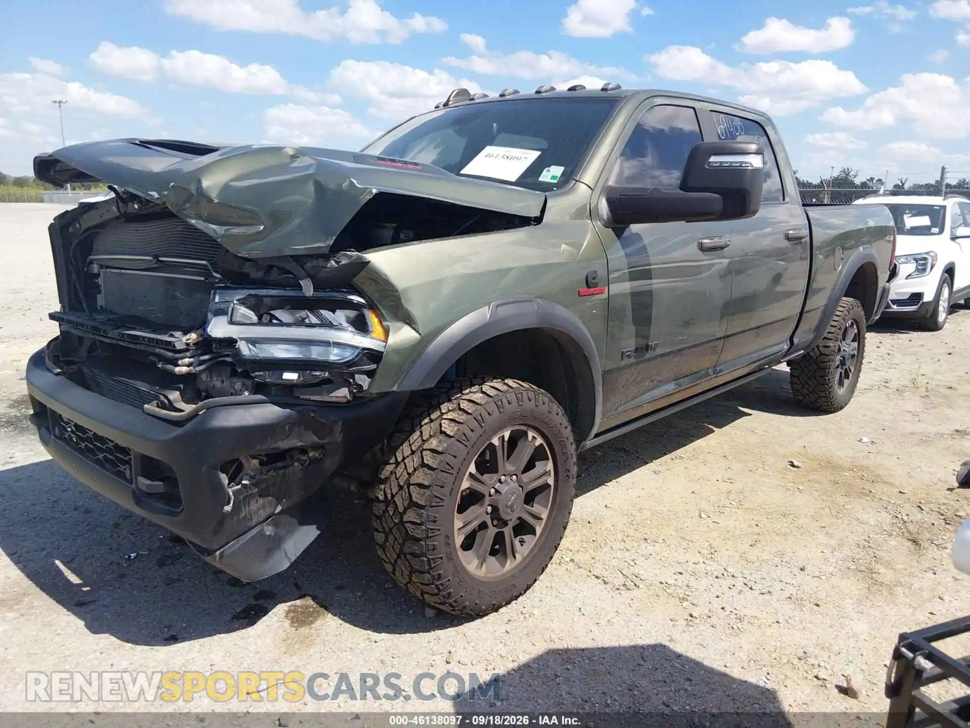 2 Photograph of a damaged car 3C6UR5EL5RG160236 RAM 2500 2024