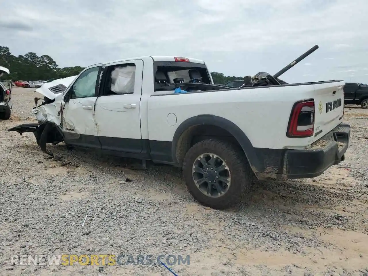 2 Photograph of a damaged car 3C6UR5EL9RG300417 RAM 2500 2024