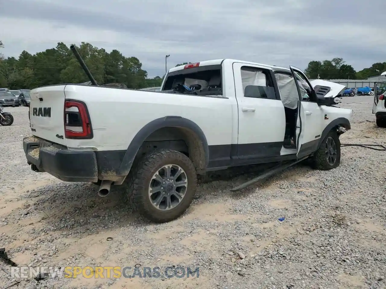 3 Photograph of a damaged car 3C6UR5EL9RG300417 RAM 2500 2024