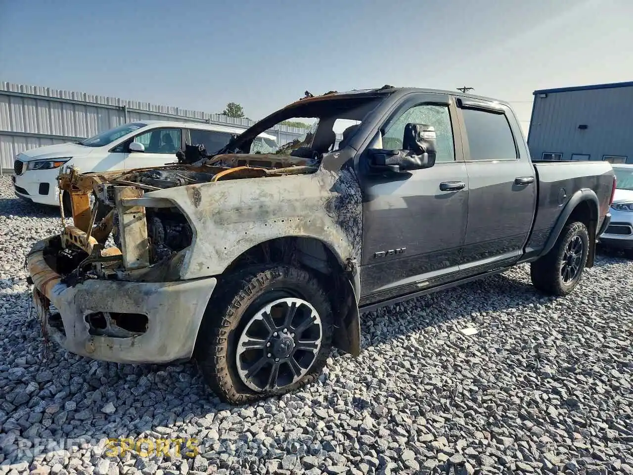 1 Photograph of a damaged car 3C6UR5ELXRG238669 RAM 2500 2024