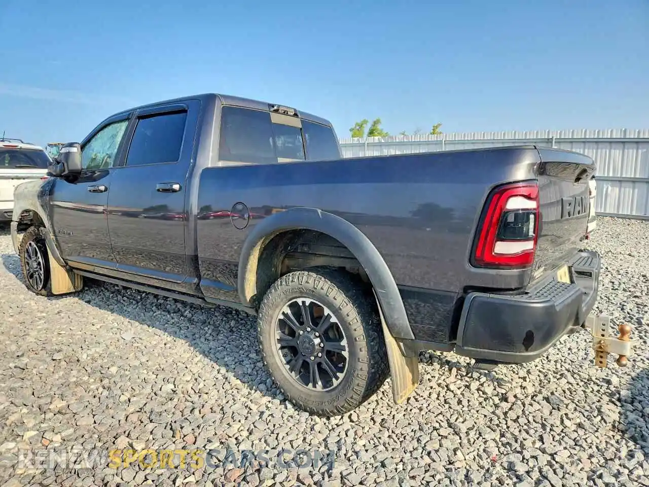 2 Photograph of a damaged car 3C6UR5ELXRG238669 RAM 2500 2024