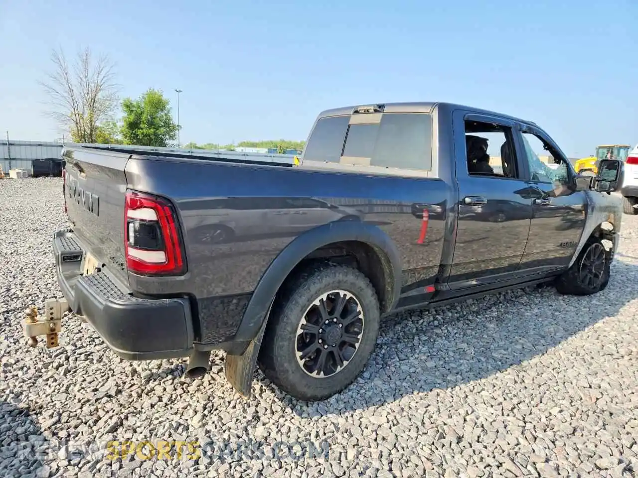 3 Photograph of a damaged car 3C6UR5ELXRG238669 RAM 2500 2024