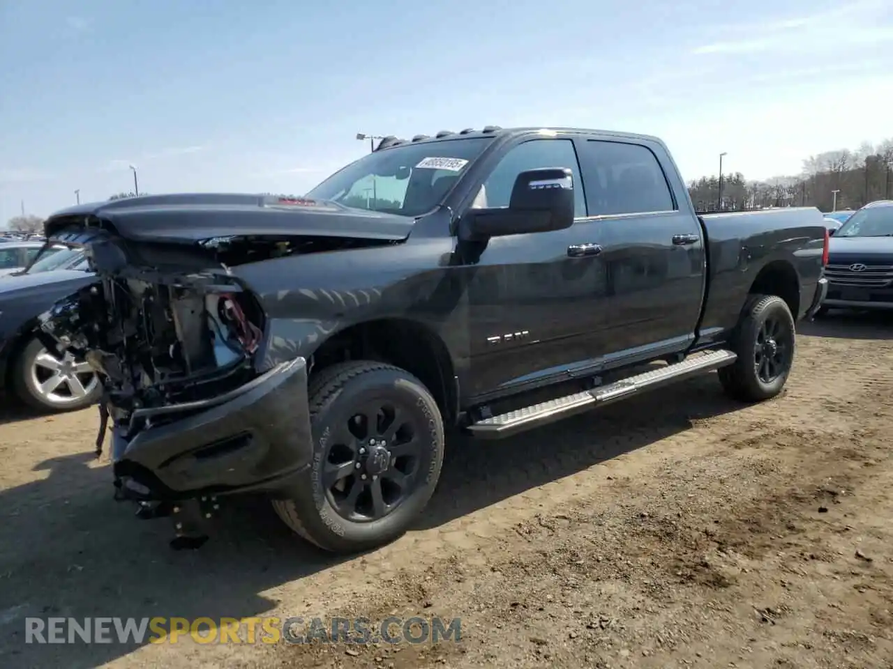 1 Photograph of a damaged car 3C6UR5FJ1RG103271 RAM 2500 2024