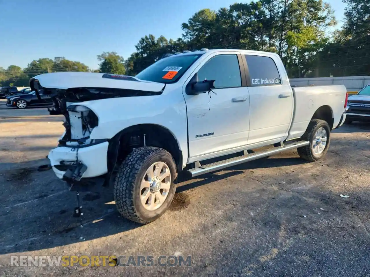 1 Photograph of a damaged car 3C6UR5FJ2RG347351 RAM 2500 2024