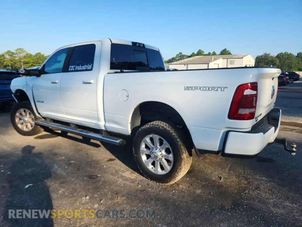 2 Photograph of a damaged car 3C6UR5FJ2RG347351 RAM 2500 2024