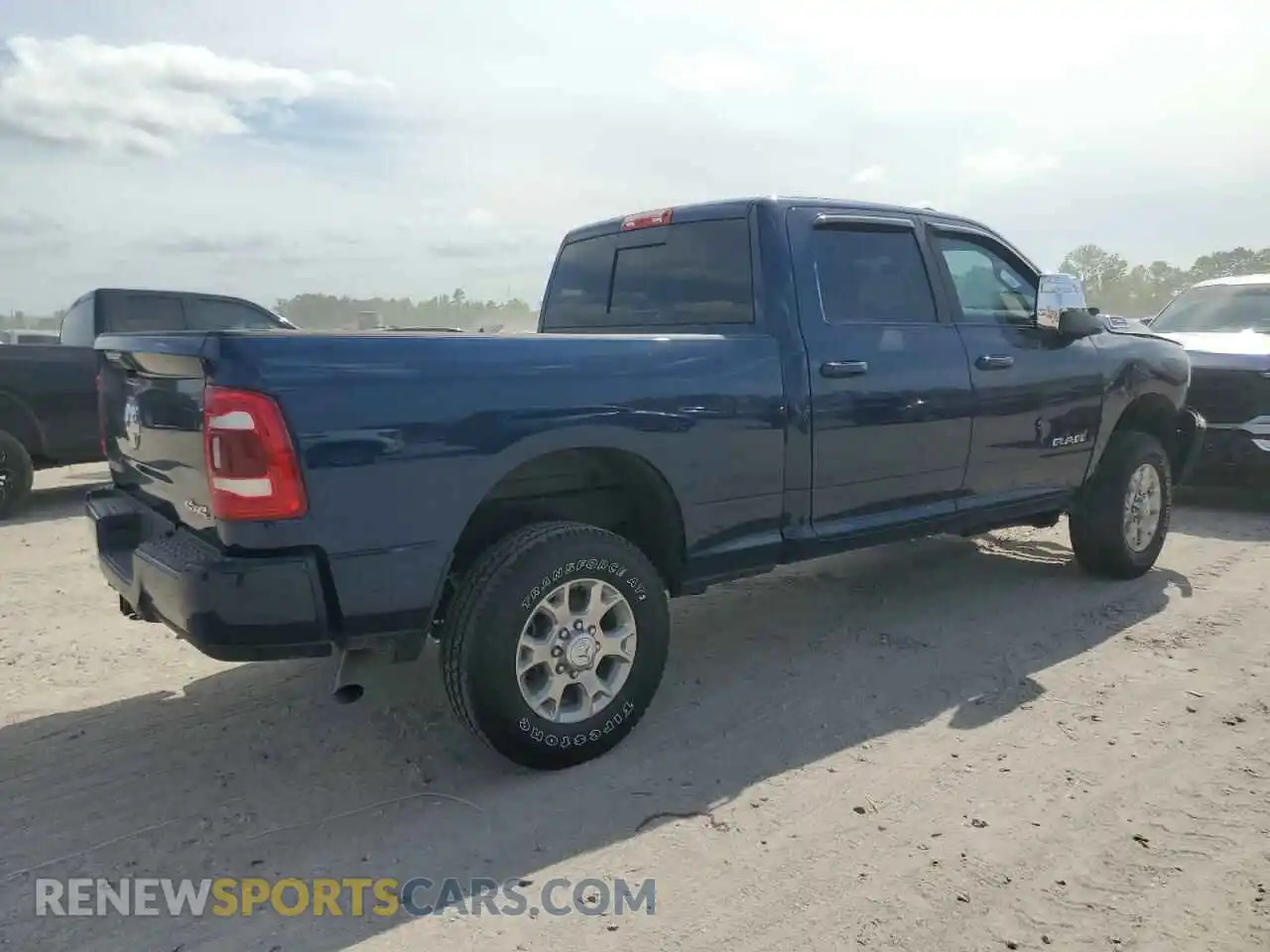 3 Photograph of a damaged car 3C6UR5FJ3RG351408 RAM 2500 2024