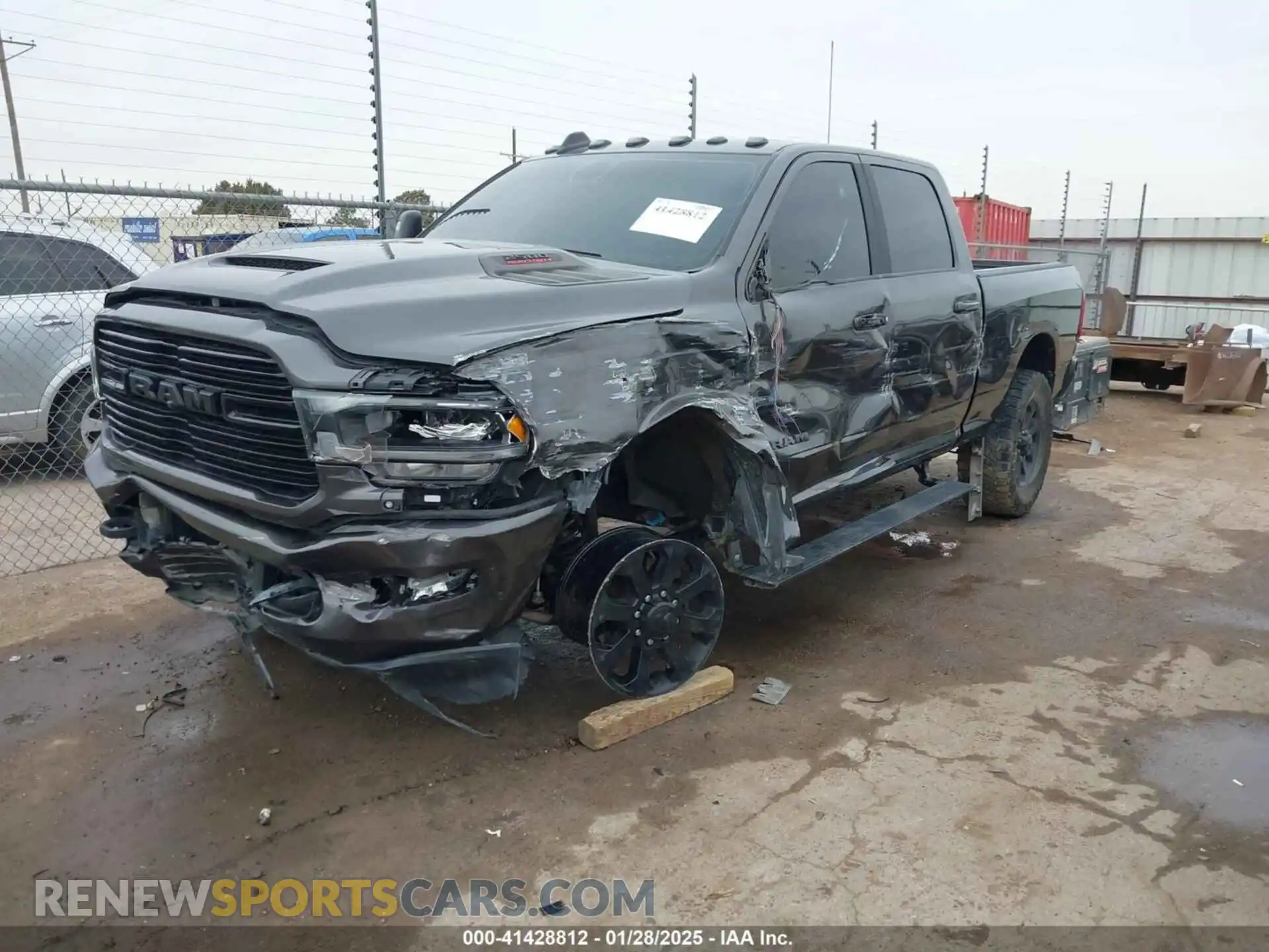 2 Photograph of a damaged car 3C6UR5FL1RG142556 RAM 2500 2024