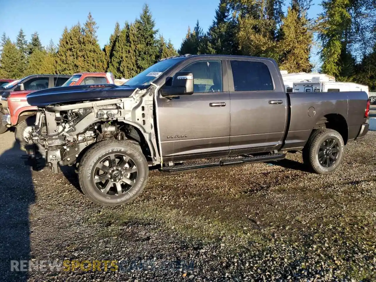 1 Photograph of a damaged car 3C6UR5FL1RG239496 RAM 2500 2024