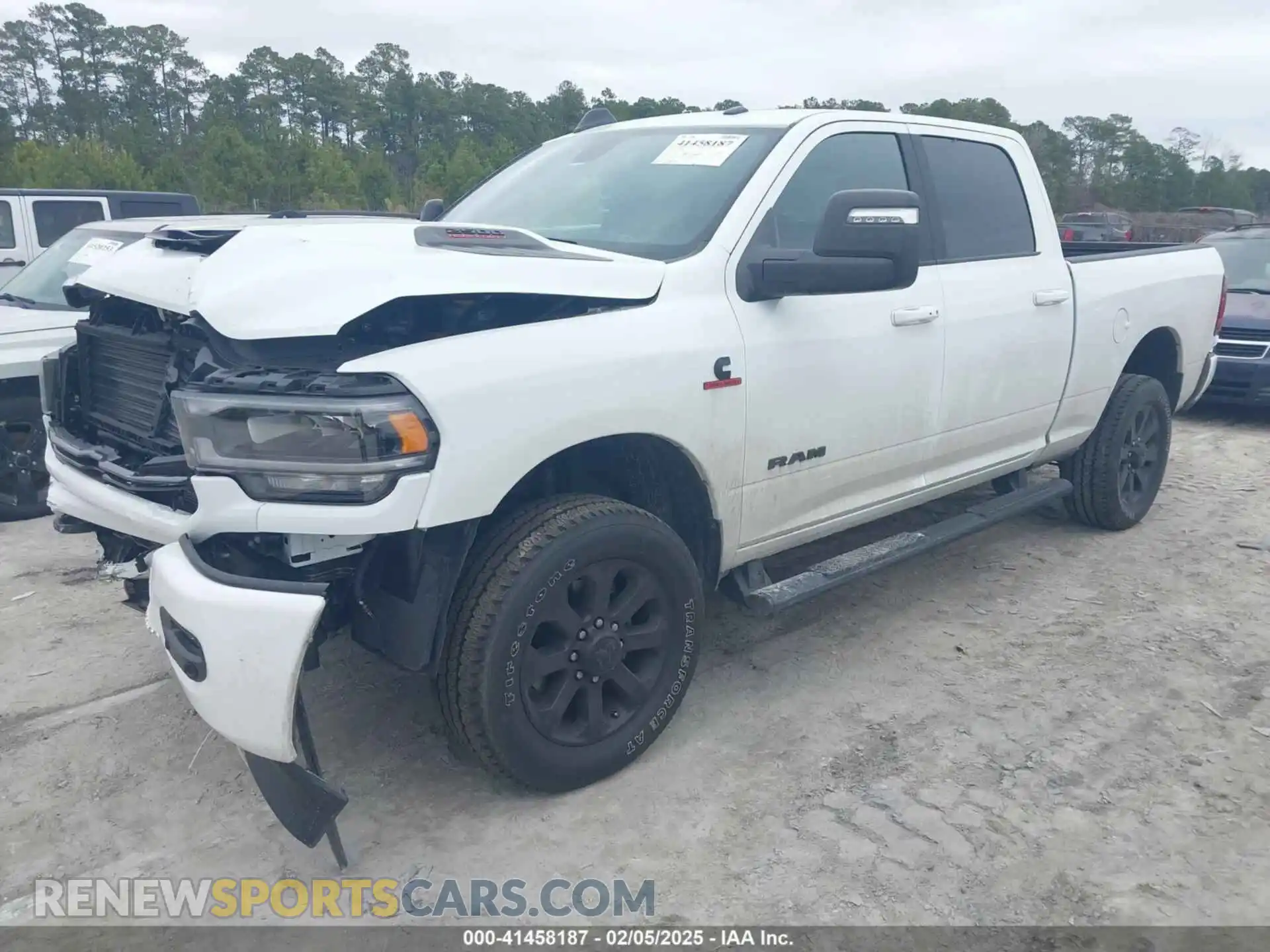 2 Photograph of a damaged car 3C6UR5FL1RG252877 RAM 2500 2024
