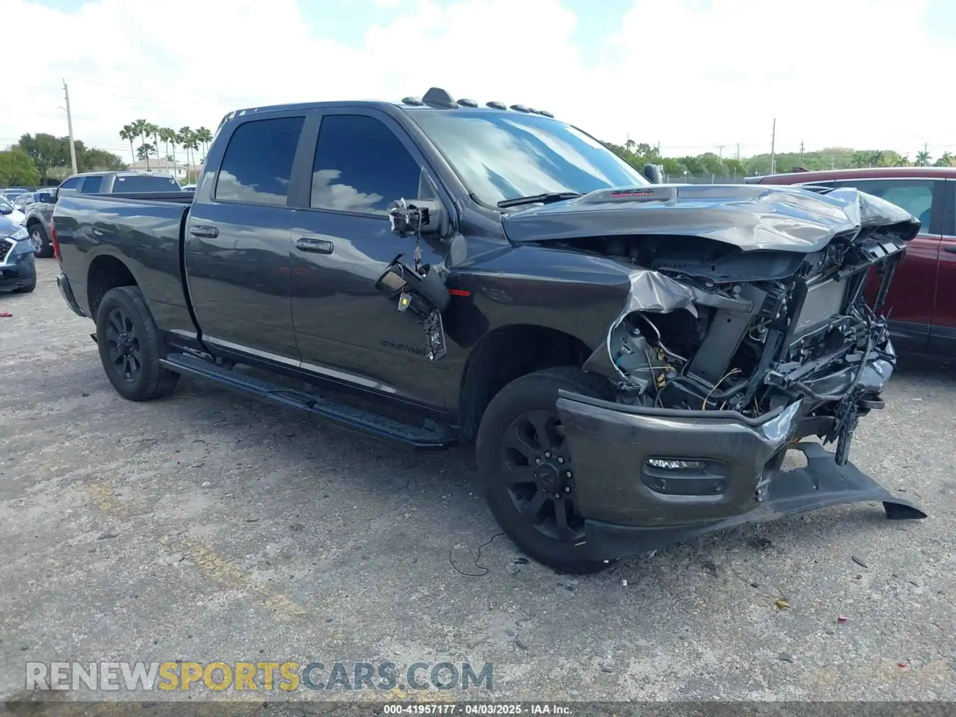 1 Photograph of a damaged car 3C6UR5FL2RG161679 RAM 2500 2024