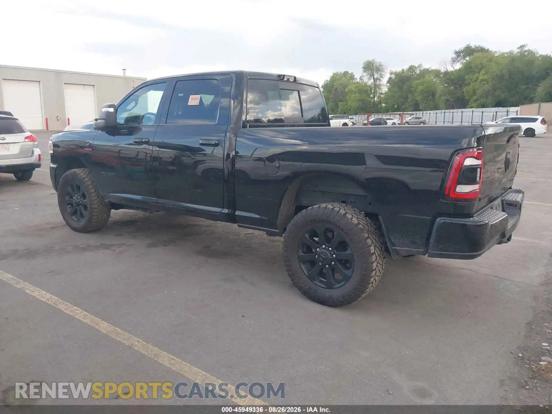3 Photograph of a damaged car 3C6UR5FL2RG172052 RAM 2500 2024