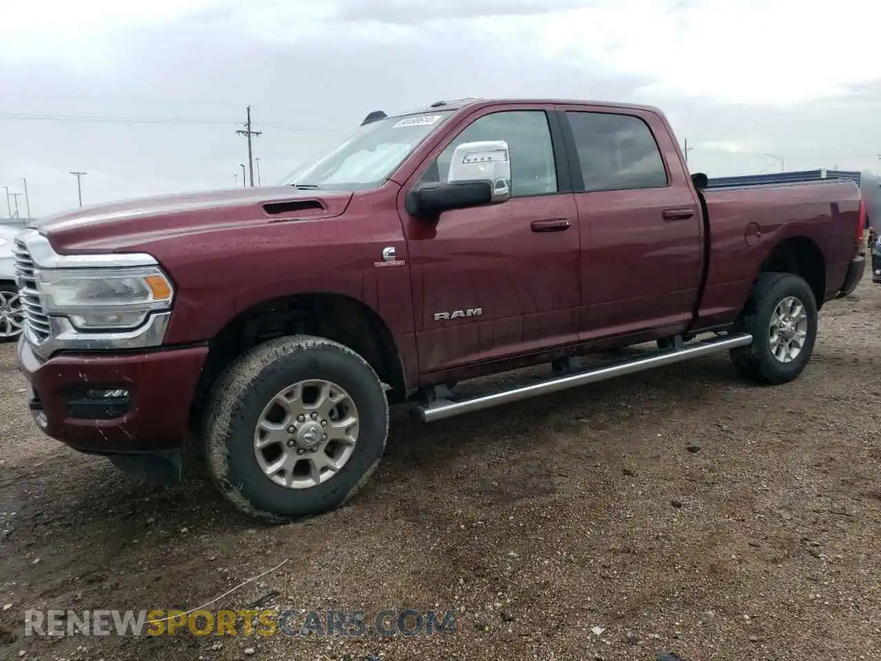 1 Photograph of a damaged car 3C6UR5FL2RG197033 RAM 2500 2024