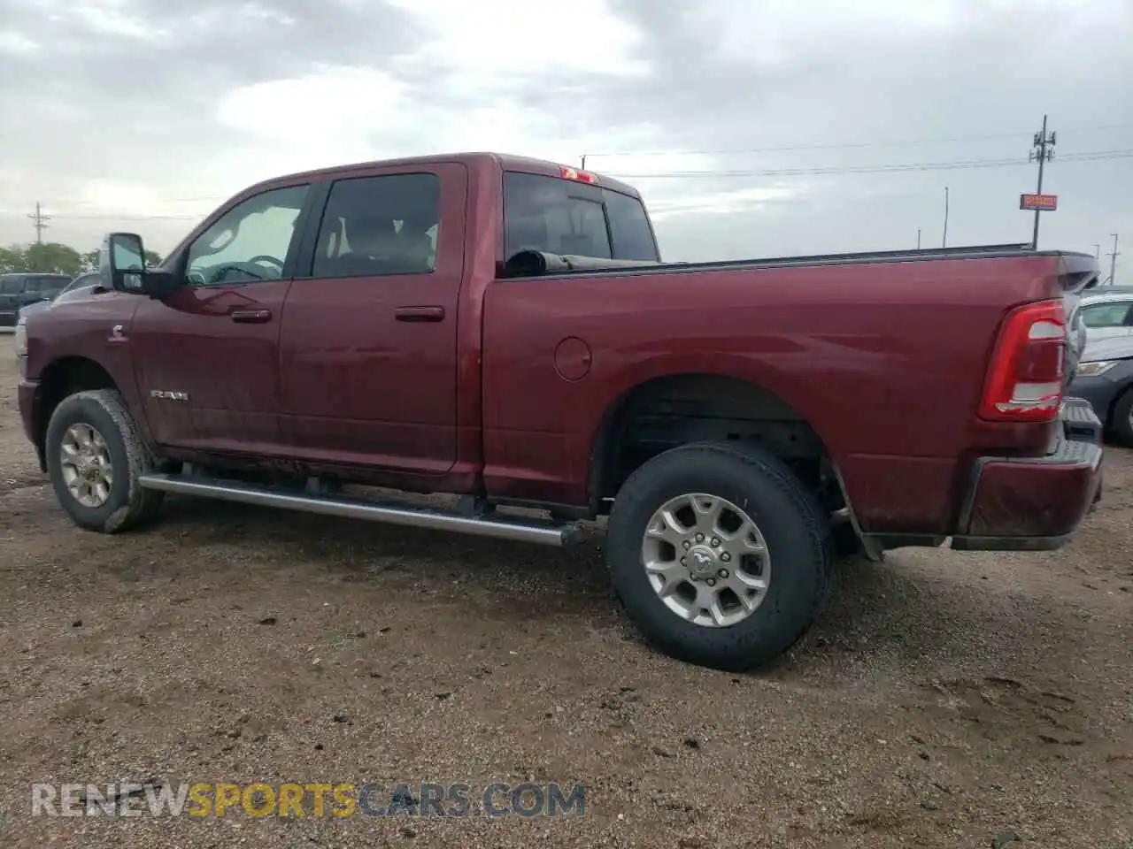 2 Photograph of a damaged car 3C6UR5FL2RG197033 RAM 2500 2024