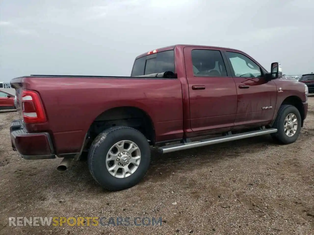 3 Photograph of a damaged car 3C6UR5FL2RG197033 RAM 2500 2024