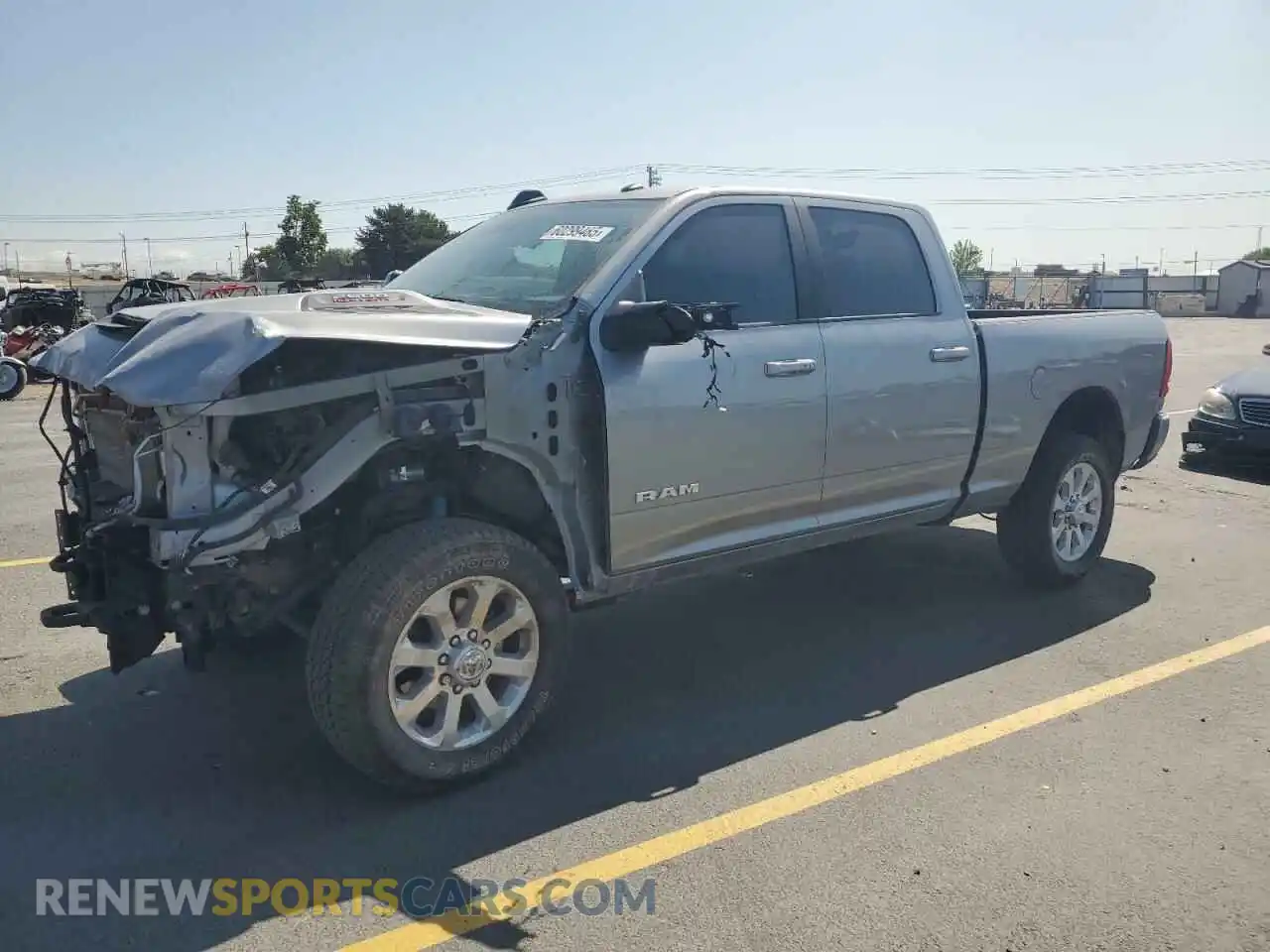 1 Photograph of a damaged car 3C6UR5FL2RG376849 RAM 2500 2024