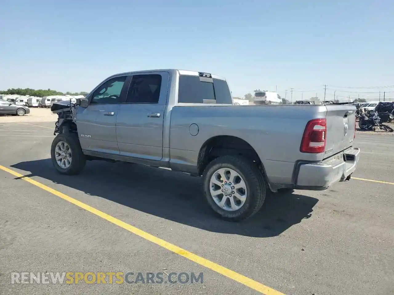2 Photograph of a damaged car 3C6UR5FL2RG376849 RAM 2500 2024