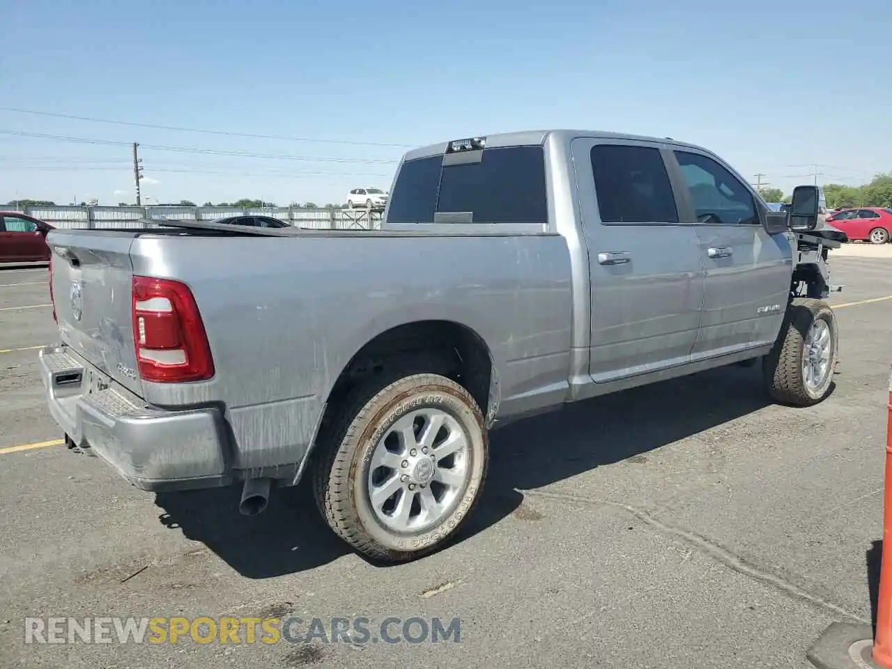 3 Photograph of a damaged car 3C6UR5FL2RG376849 RAM 2500 2024
