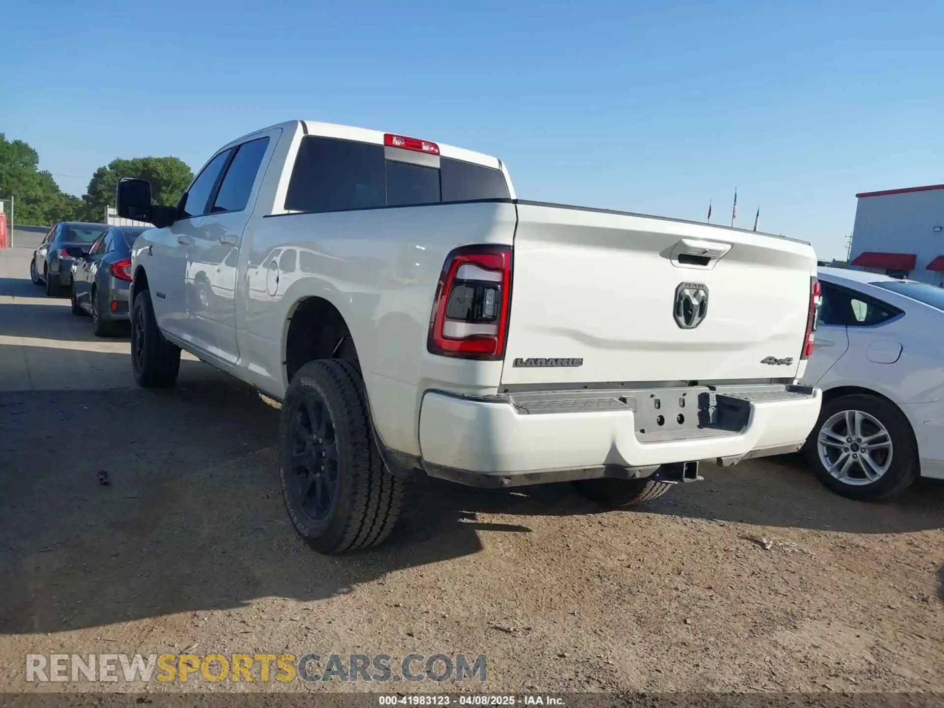 3 Photograph of a damaged car 3C6UR5FL3RG312836 RAM 2500 2024