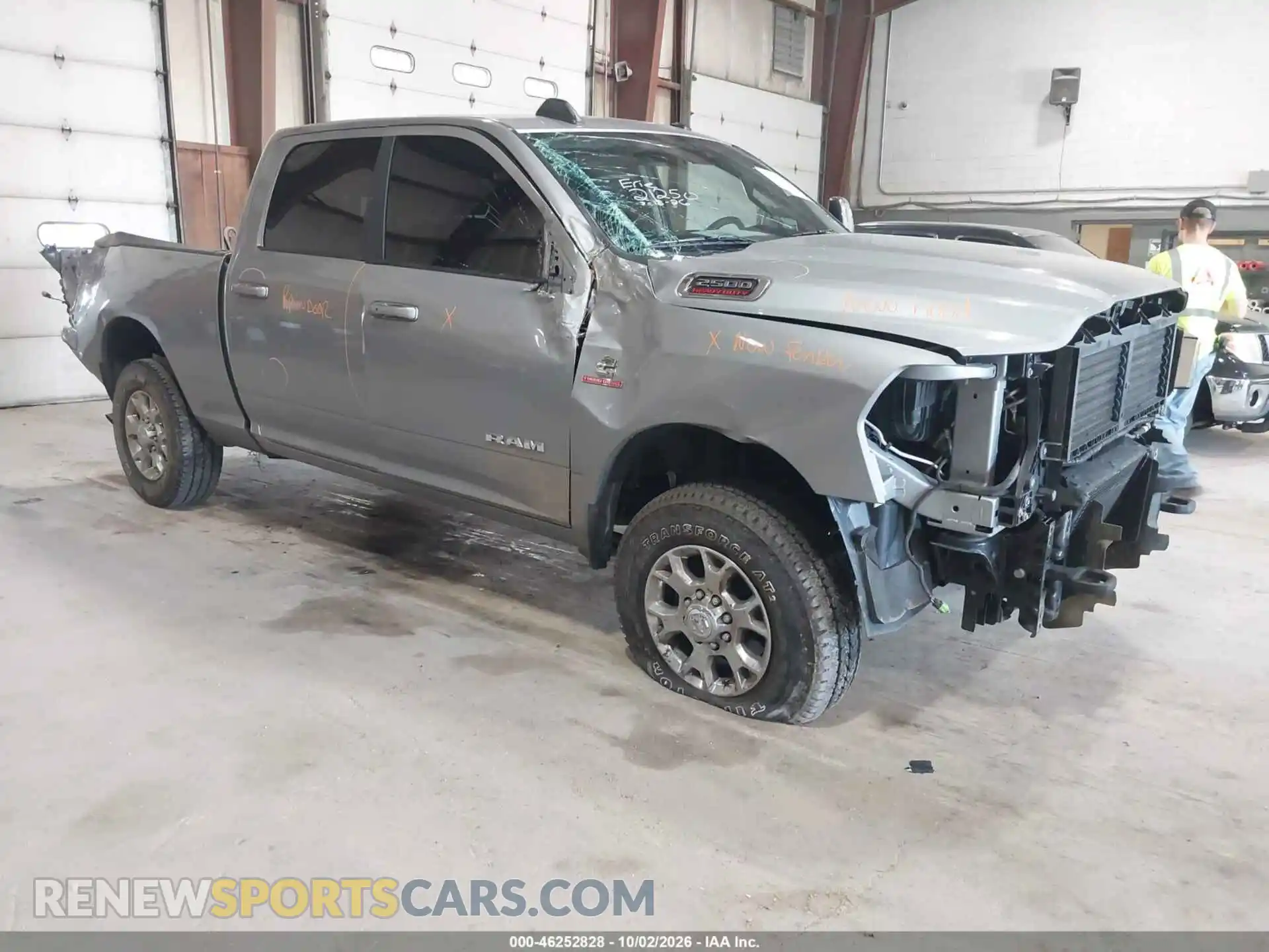 1 Photograph of a damaged car 3C6UR5FL3RG366931 RAM 2500 2024